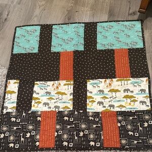 Orange and Black Quilted Blanket